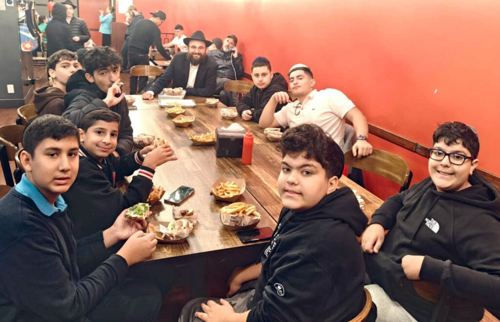 Kapparot Ritual Draws Teens to Crown Heights