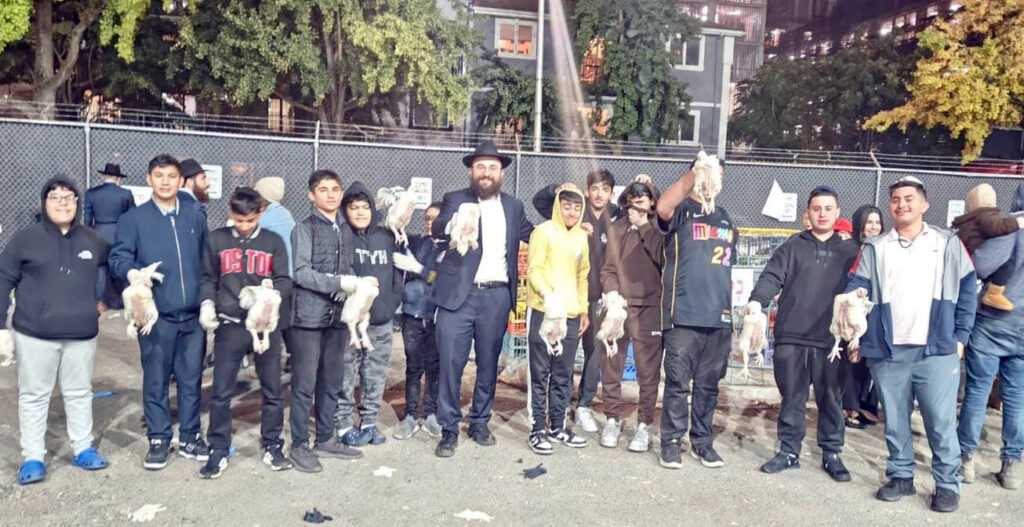 Kapparot Ritual Draws Teens to Crown Heights